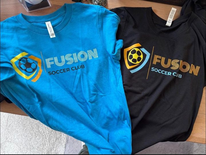 Fusion Soccer Club shirts in club blue and black