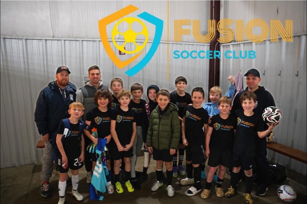 Fusion Soccer Club players and coaches after an indoor training session